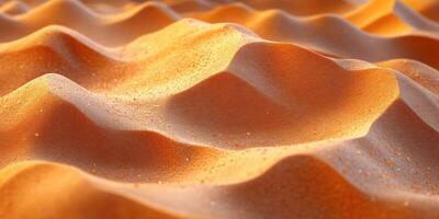 an orange sand dune with water droplets on it photo