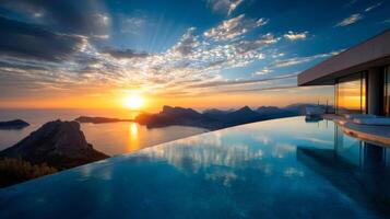 Breathtaking sunset view from an infinity pool overlooking mountains and ocean, capturing the beauty of nature and tranquility photo