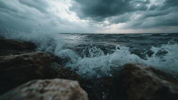 Dramatic Seascape with Turbulent Waves Crashing on Rocky Shore Under Dark Clouds in Stormy Weather photo