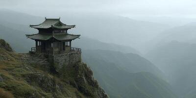 Serene Mountain Temple with Traditional Architecture Surrounded by Misty Hills and Lush Greenery Beneath a Cloudy Sky photo