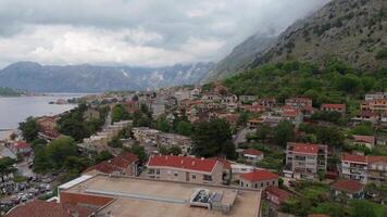 Aerial view of Kotor Stari Grad Montenegro with ancient architecture and mountain backdrop video