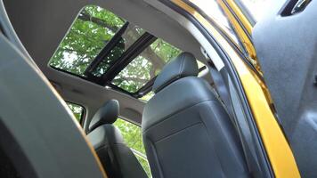 Tilt Glass Sunroof And Sun Curtain Sliding And Opening Bottom View From Rear Seats In 4K Resolution video