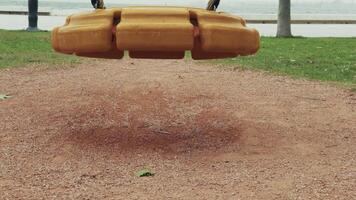 Orange Swing in the Childrens Playground video