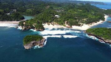 High Altitude Drone Flight from Sea to Island and Tropical Shore, East Java, Indonesia video