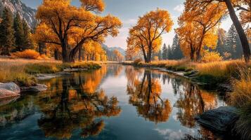 Autumn landscape featuring a tranquil river and vibrant orange trees in a serene mountainous area photo