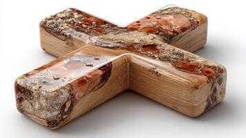 Unique wooden sculpture featuring cross design with resin accents in natural tones photo