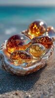 Unique amber-colored orbs displayed on a seashell along a sandy beach at sunset creating a tranquil seaside atmosphere photo