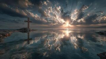 Sunrise over calm waters with cross reflection against dramatic cloudscape in serene landscape photo