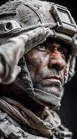 Warrior salutes in a dusty environment showcasing determination and strength during military operations photo