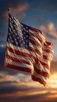 Captivating American flag waving majestically against a colorful sunset sky photo
