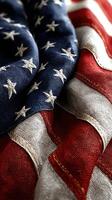 Close-up of an American flag showcasing intricate stitching and vibrant colors with textured fabric elements photo