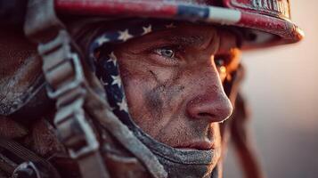 Soldier in urban battlefield at dusk with intense expression and weathered helmet displaying American flag pattern photo