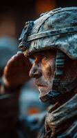 Soldier saluting in the early morning frost during training exercises in a military base photo