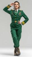 Military personnel poses confidently in a green uniform showcasing medals and badges indoors photo