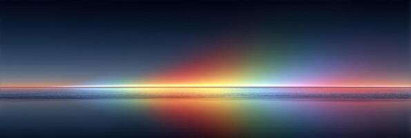 Vibrant sunset over calm water reflecting a spectrum of colors in the sky photo