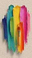Colorful paint strokes with a brush on a textured surface showcasing artistic creativity photo