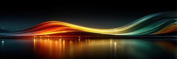 Colorful light waves reflect on calm water surface during a serene night in a vibrant urban setting photo