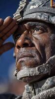 Saluting soldier in full uniform pays tribute under clear blue sky during military ceremony photo