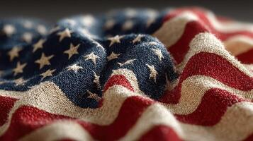 Waving textile with stars and stripes, representing national pride in a close-up view showing intricate fabric details photo