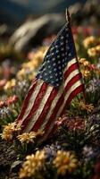 Colorful flags and vibrant flowers create a patriotic display in a sunny meadow during the spring season photo