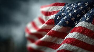 Waving American flag under cloudy sky showcasing patriotism and resilience in a dramatic setting photo