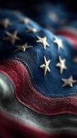 Close-up view of a waving flag featuring stars and stripes on a textured fabric photo