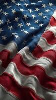 American flag draped on a surface showcasing fabric texture and vivid colors during daylight hours photo