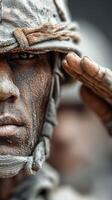 Soldier saluting with respect during a military ceremony in a solemn outdoor setting photo