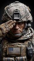 Soldier performing a salute in full military gear, showcasing dedication and honor in an intense moment of reflection photo
