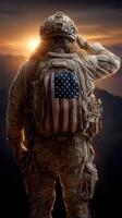 Soldier saluting with American flag backpack at sunset in mountainous terrain photo