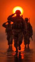 Soldiers salute at sunset, reflecting courage and unity during a mission in a warm desert environment photo