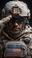 Soldier in tactical gear salutes while covered in frost during winter training exercise in remote location photo