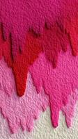 Abstract art piece featuring vibrant pink and red textured layers on a soft background photo