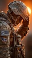 Soldier paying respect during sunrise in a frosty environment at a military training site photo
