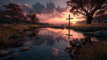 Stunning sunset landscape with reflection in water, featuring a cross and serene nature setting photo