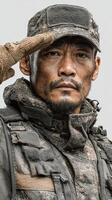 Soldier saluting with determination during training in a military environment photo