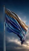 Flag waving proudly against a dramatic sky during sunset in a serene outdoor setting photo