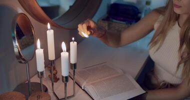 Experience a serene atmosphere created by the soft glow of candles, ideal for reading video