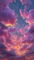 Vibrant sunset clouds create a stunning twilight sky over the horizon in a serene evening setting photo