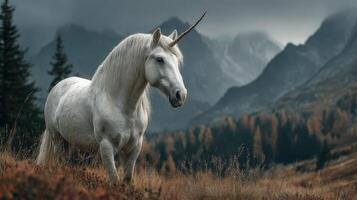 Mystical white unicorn standing majestically in a misty mountain landscape during twilight photo