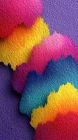 Colorful abstract layers create a vibrant visual display with various hues and textures on a purple background photo
