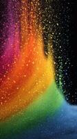 Colorful powder bursts create a vibrant rainbow effect against a dark background during a festive celebration photo