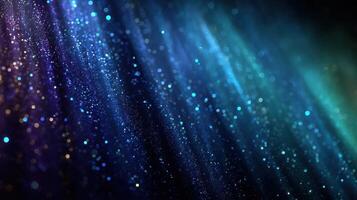 Colorful particles illuminated in a dark background create a mesmerizing visual effect during nighttime photo
