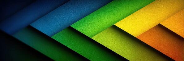 Colorful layers of paper create a vibrant background showcasing varying shades of blue, green, yellow, and orange in a modern design photo