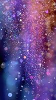 Bright and colorful abstract particles with a shimmering effect in a dark background creating a magical atmosphere photo