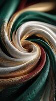 Intricate swirl of textured fabric showcasing rich colors and patterns in natural light, perfect for design inspiration photo