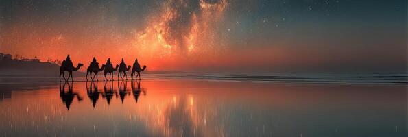 Camel caravan travels along a tranquil beach at sunset under a starry sky photo