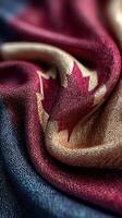 Textured close-up of a Canadian flag fabric showcasing intricate details and vibrant colors photo