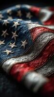 Old American flag with textured fabric details representing history and pride captured in artistic light photo