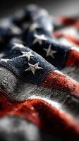 Waving American flag with detailed fabric texture captured in dramatic light and shadows photo